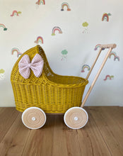 Load image into Gallery viewer, LUXURY mustard wicker pram with light pink bow and matching bedding included, wicker doll pram UK, pram toy, wooden pram, 1st birthday