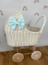 Load image into Gallery viewer, Wicker pram with bow, tall dolls pram, bow and bedding included. Cream/ off white pram with mint set
