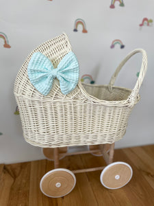 Wicker pram with bow, tall dolls pram, bow and bedding included. Cream/ off white pram with mint set