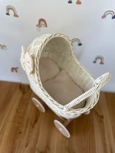 Load image into Gallery viewer, Wicker pram with bow, tall dolls pram, bow and bedding included. Cream/ off white pram
