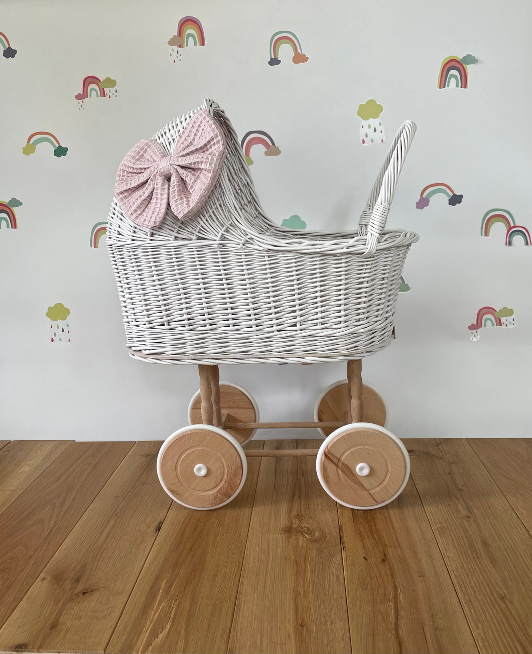 Wicker pram with bow, tall dolls pram, bow and bedding included. White