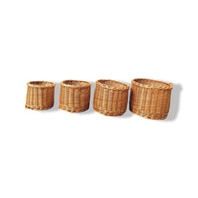 Load image into Gallery viewer, Set of 4 round wicker baskets.
