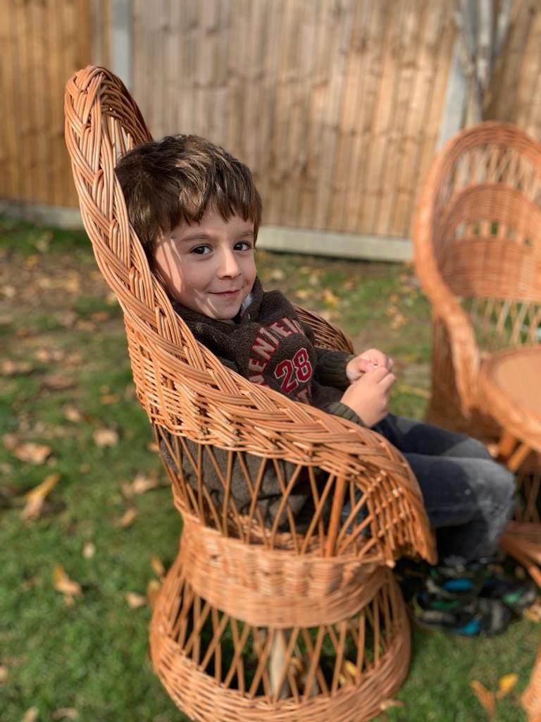 Child's wicker rocking store chair