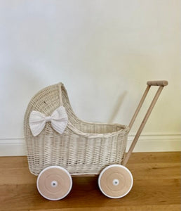 Luxury set of cream wicker doll stroller and wicker crib with bow, bedding, bow and name tag included.