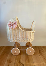 Load image into Gallery viewer, Wicker pram with bow, tall dolls pram, bow and bedding included. Cream/ off white unpainted.
